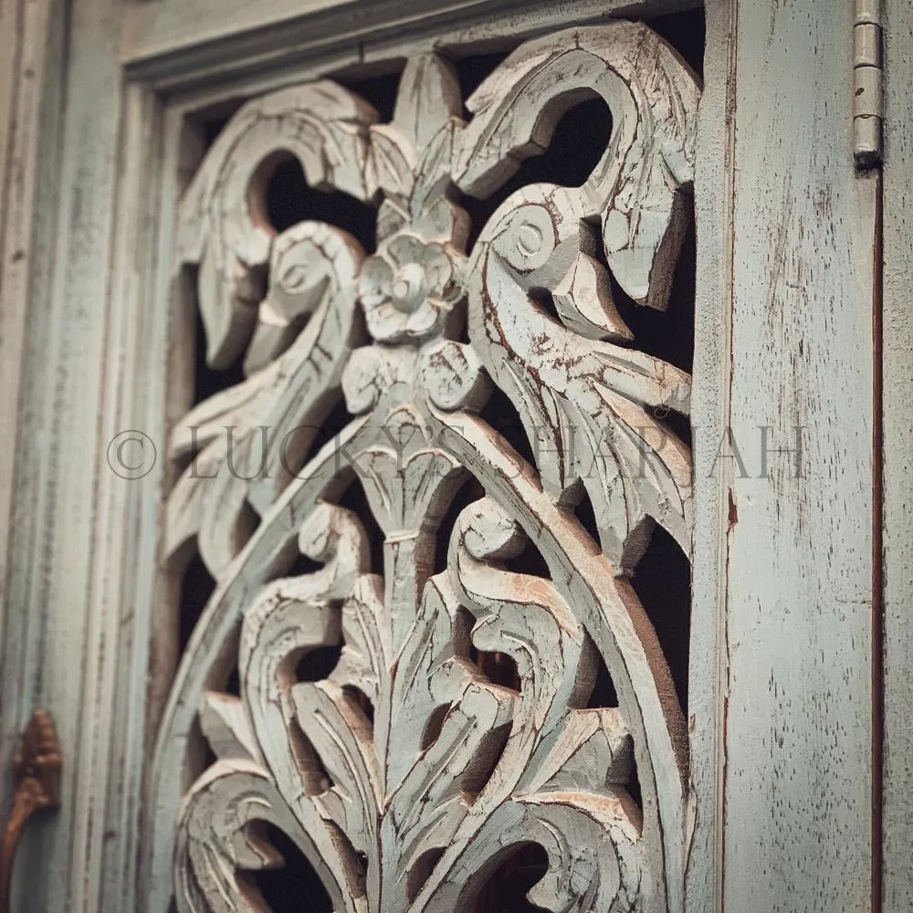 Carved sky blue cabinet with drawers