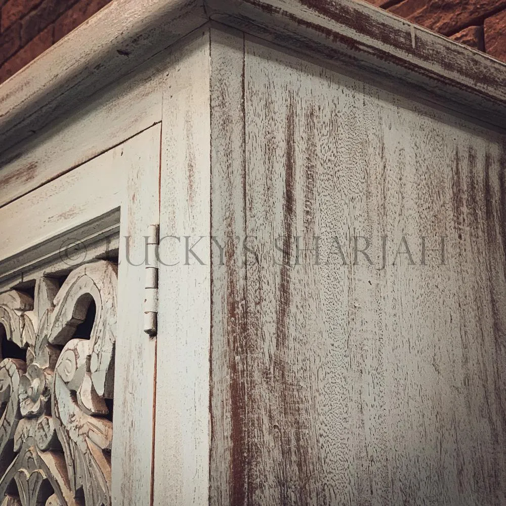 Carved sky blue cabinet with drawers